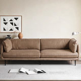 أريكة من القماش غير اللامع بتصميم كريمي - راحة وأناقة عصرية